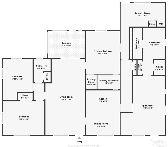 a view of a backyard with plants and large tree