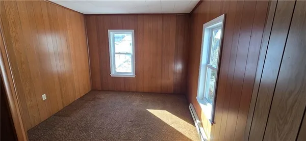 a view of an empty room and window