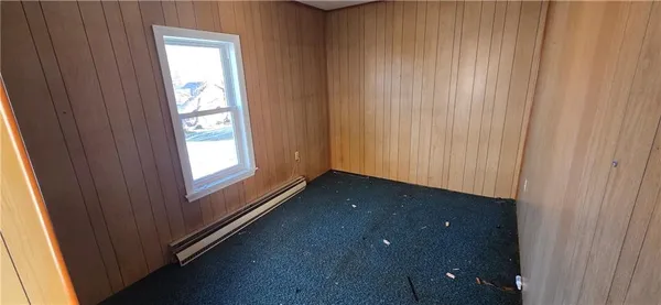 a bathroom with a toilet and a bathtub