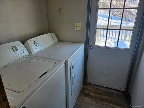 a utility room with dryer and washer