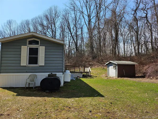 a front view of a house with yard