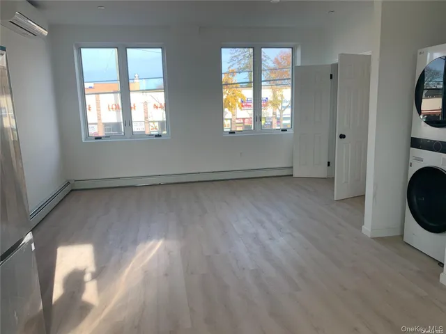 a view of livingroom with hardwood floor and window