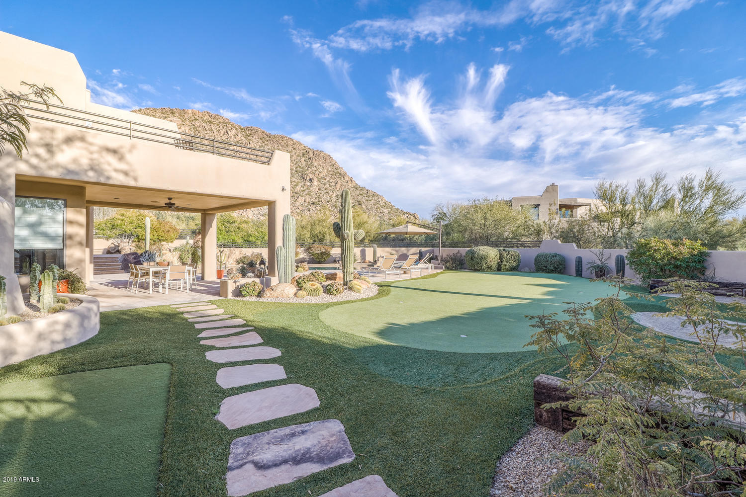 10040 East Happy Valley Road, Unit 442 Scottsdale, AZ 85255 - Photo 51 of 78 a view of swimming pool is middle in the garden