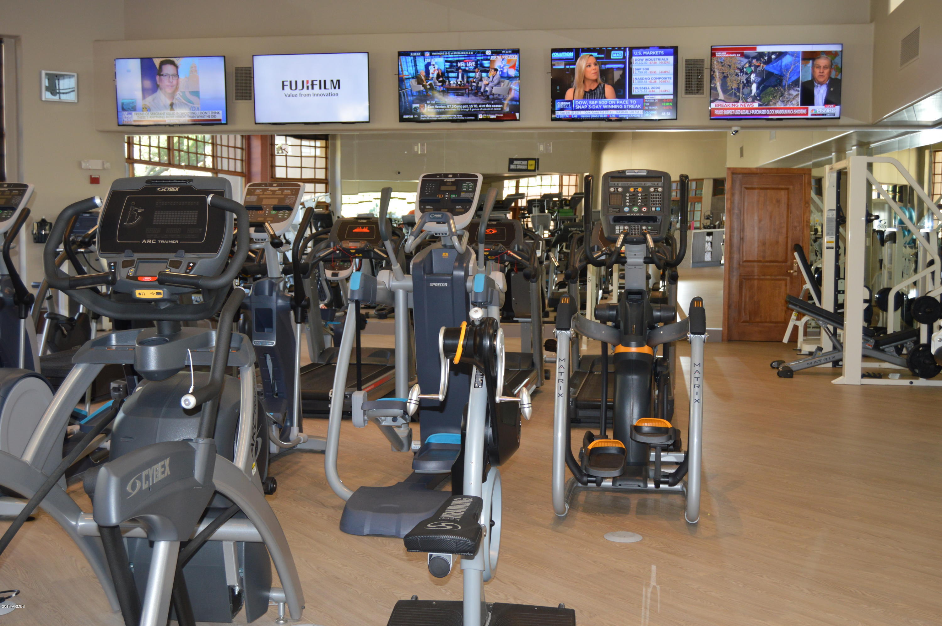 10040 East Happy Valley Road, Unit 442 Scottsdale, AZ 85255 - Photo 74 of 78 a view of a room with gym equipment