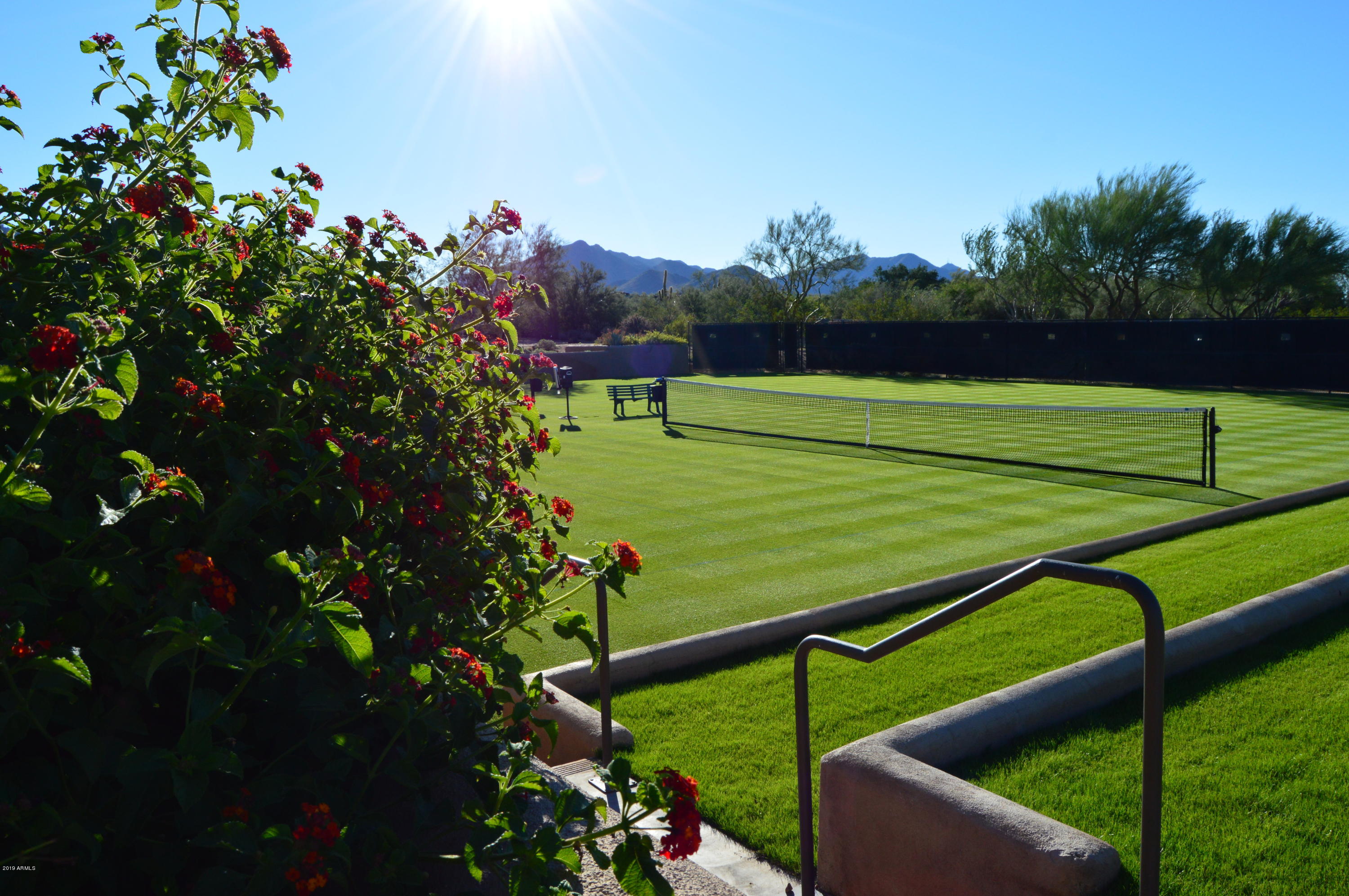 10040 East Happy Valley Road, Unit 442 Scottsdale, AZ 85255 - Photo 78 of 78 a view of a tennis court