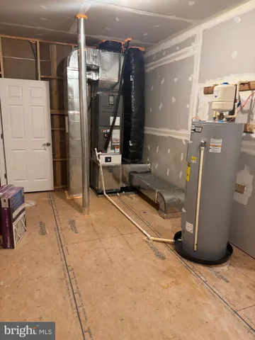 a view of a hall with wooden floor