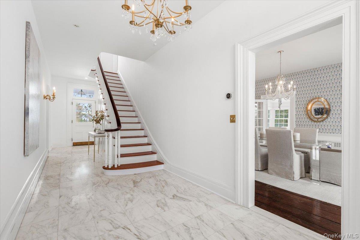 77 Pleasant Ridge Road Harrison, NY 10528 - Photo 5 of 35 a view of an entryway with staircase