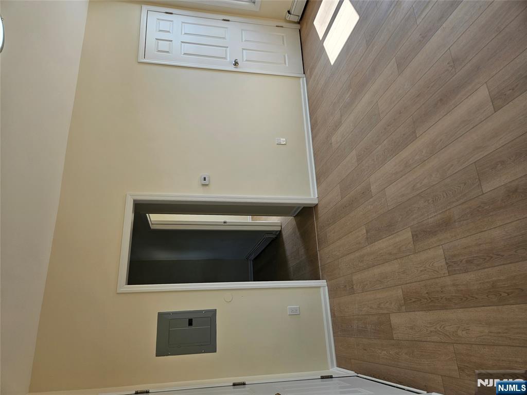 372 Bergen Street Newark, NJ 07103 - Photo 13 of 29 a view of an empty room with wooden floor and closet