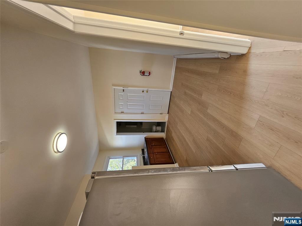 372 Bergen Street Newark, NJ 07103 - Photo 22 of 29 a view of empty room with wooden floor and fan