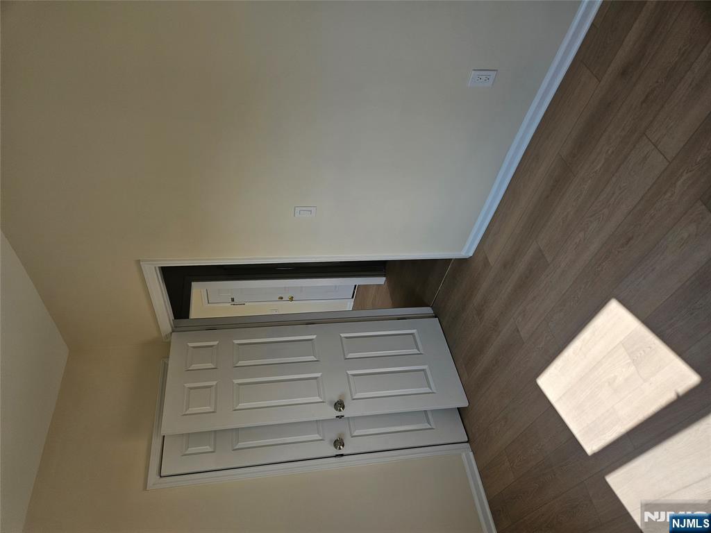 372 Bergen Street Newark, NJ 07103 - Photo 28 of 29 wooden floor in an empty room