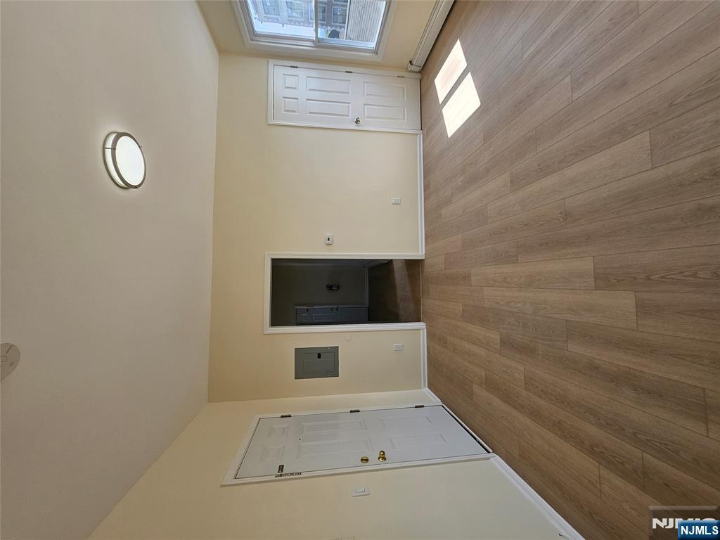 372 Bergen Street Newark, NJ 07103 - Photo 9 of 29 a view of empty room with wooden floor and window