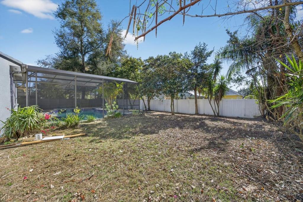 8618 Valley Ridge Court Orlando, FL 32818 - Photo 23 of 24 a view of a garden