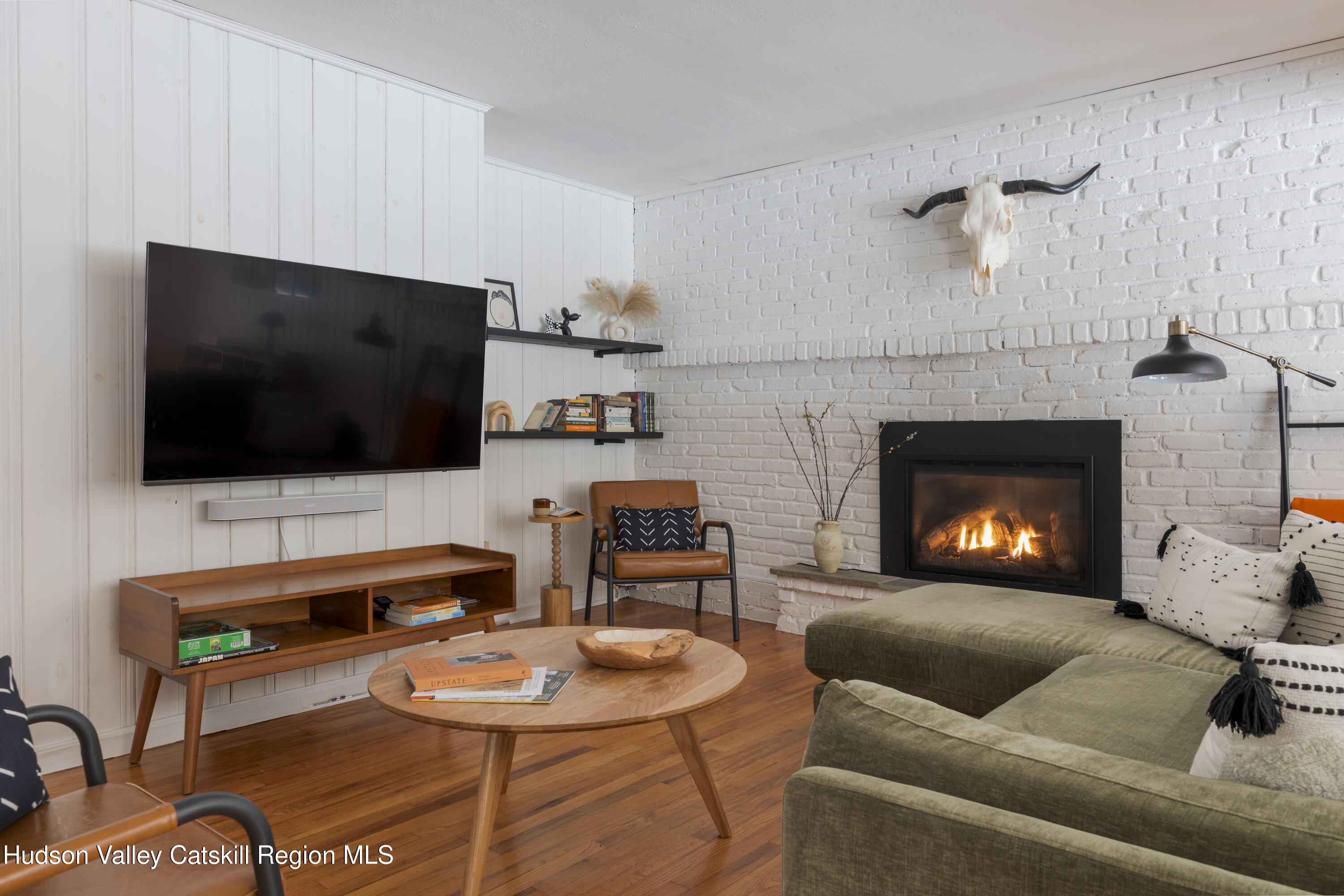 26 Krom Road Olivebridge, NY 12461 - Photo 8 of 24 a living room with furniture and a fireplace