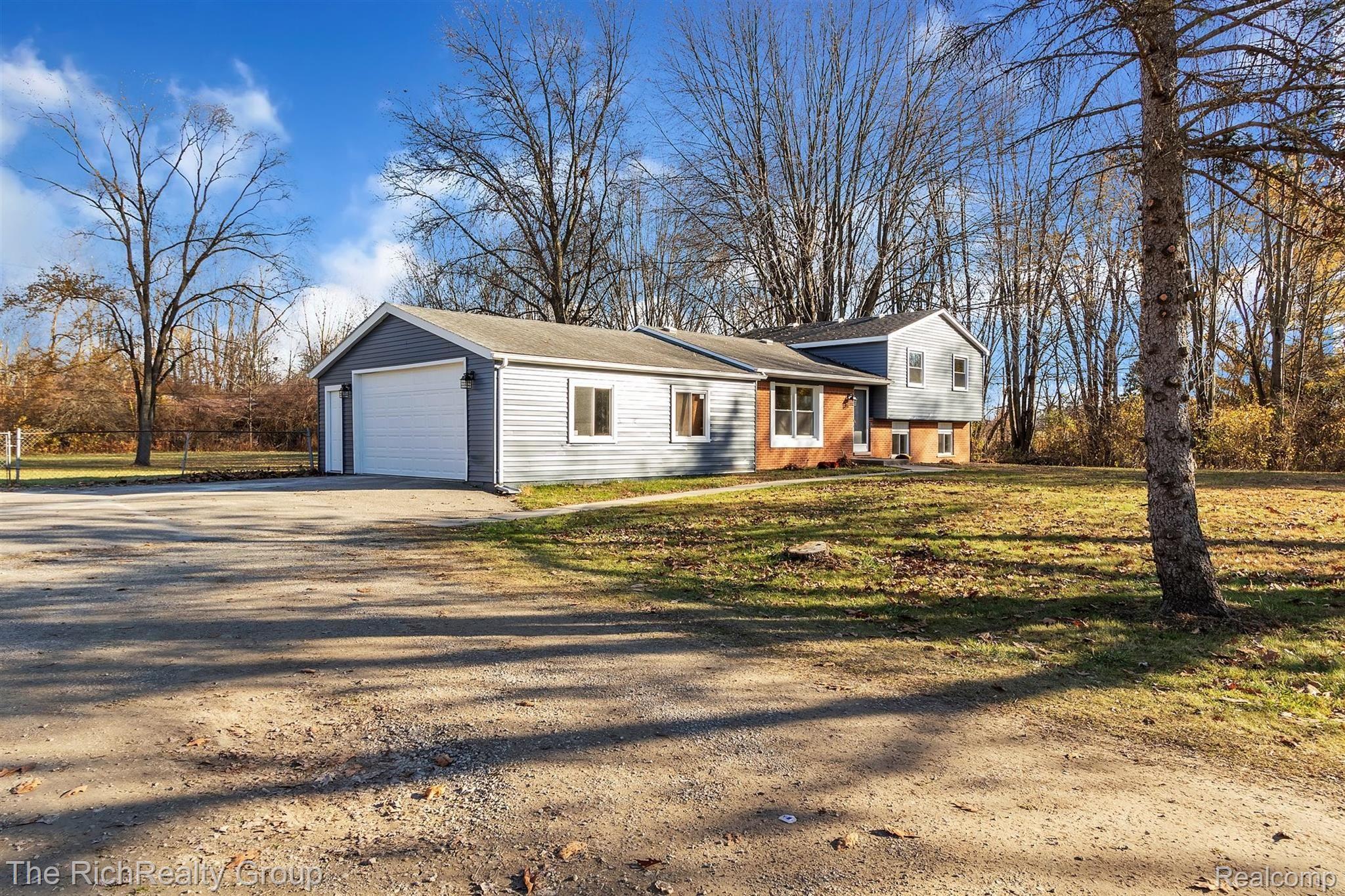 22701 Dickinson Road New Boston, MI 48164 - Photo 2 of 43 02-22701 Dickinson Rd-WindowStill-R.jpg