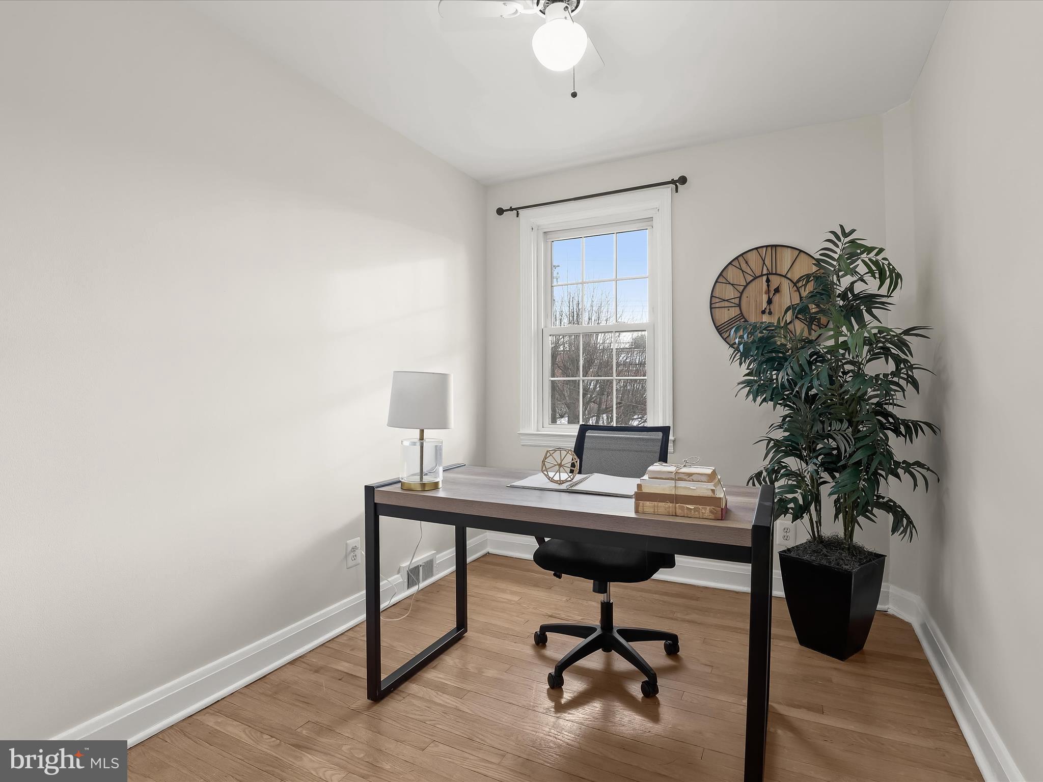 317 Overbrook Road Baltimore, MD 21212 - Photo 31 of 52 a view of a workspace with a window and chair