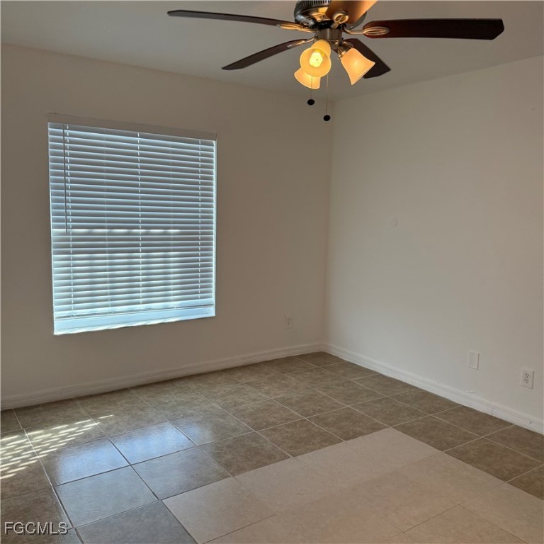 2172 Simon Court Fort Myers, FL 33916 - Photo 13 of 15 a view of an empty room with a window