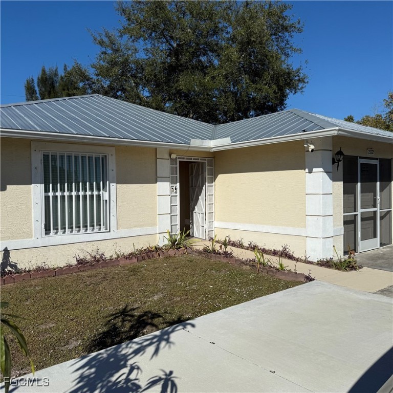 2172 Simon Court Fort Myers, FL 33916 - Photo 2 of 15 a front view of a house