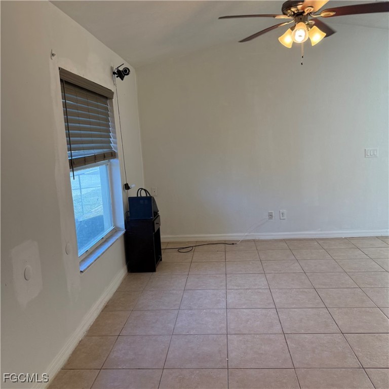 2172 Simon Court Fort Myers, FL 33916 - Photo 3 of 15 a view of an empty room with a window