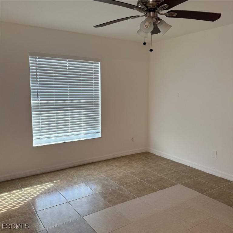 2172 Simon Court Fort Myers, FL 33916 - Photo 8 of 15 a view of an empty room with a window