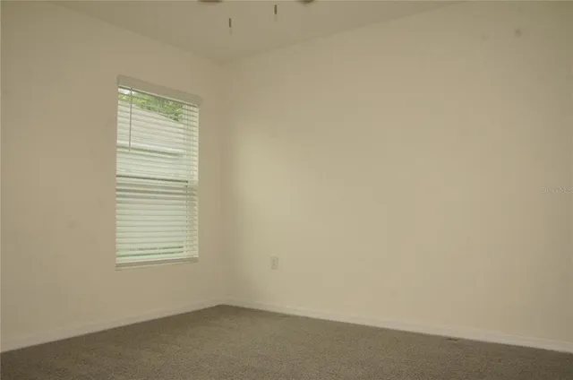 an empty room with a window