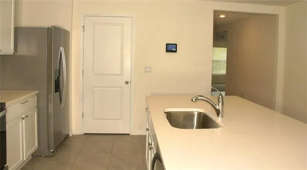 a bathroom with a sink a bathtub and a shower
