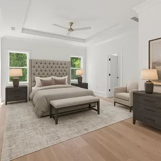 a spacious bathroom with a double vanity sink a mirror and a bathtub