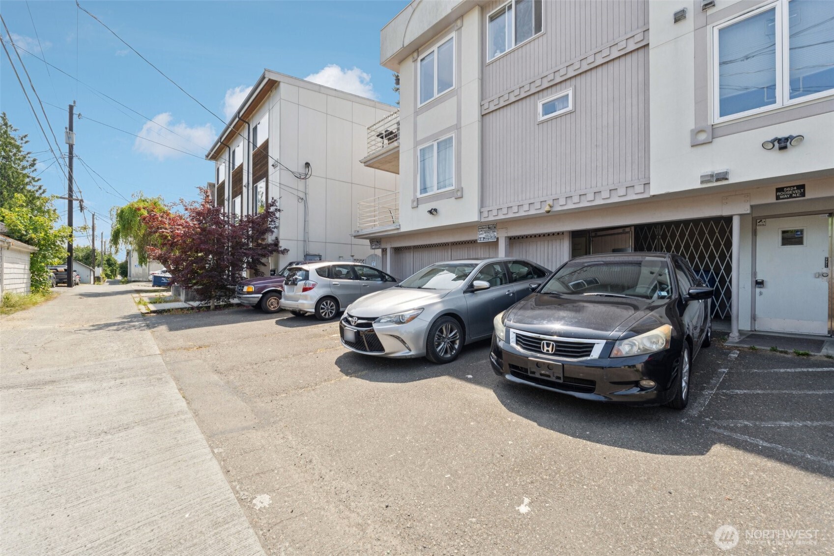 5624 Roosevelt Way Northeast, Unit 202 Seattle, WA 98105 - Photo 19 of 21 a car parked in front of a building