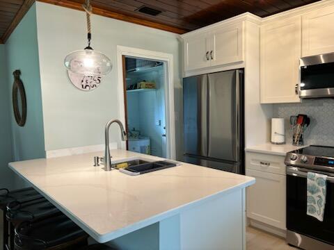 4404 Southeast Mulford Lane Stuart, FL 34997 - Photo 13 of 22 4404 MULFORD GREAT KITCHEN SHOT IMG_0064