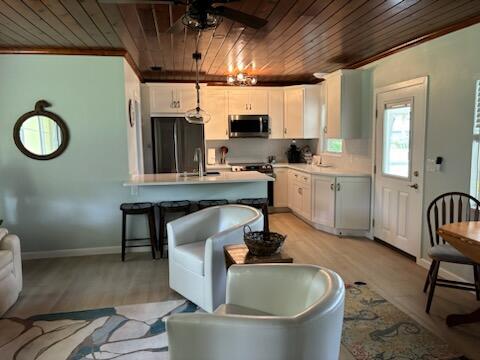 4404 Southeast Mulford Lane Stuart, FL 34997 - Photo 14 of 22 4404 MULFORD GOOD PIC OF LIV AND KITCHEN