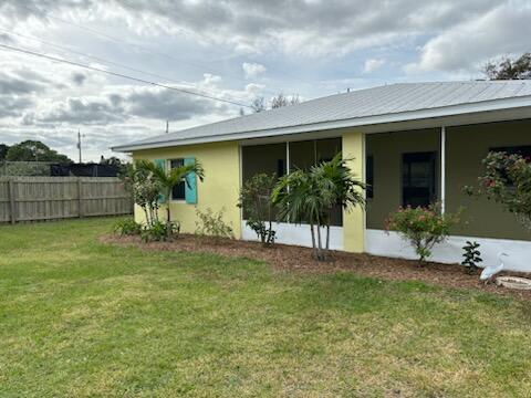 4404 Southeast Mulford Lane Stuart, FL 34997 - Photo 2 of 22 MULFORD EXTERIOR SIDE FOR MLS 2025