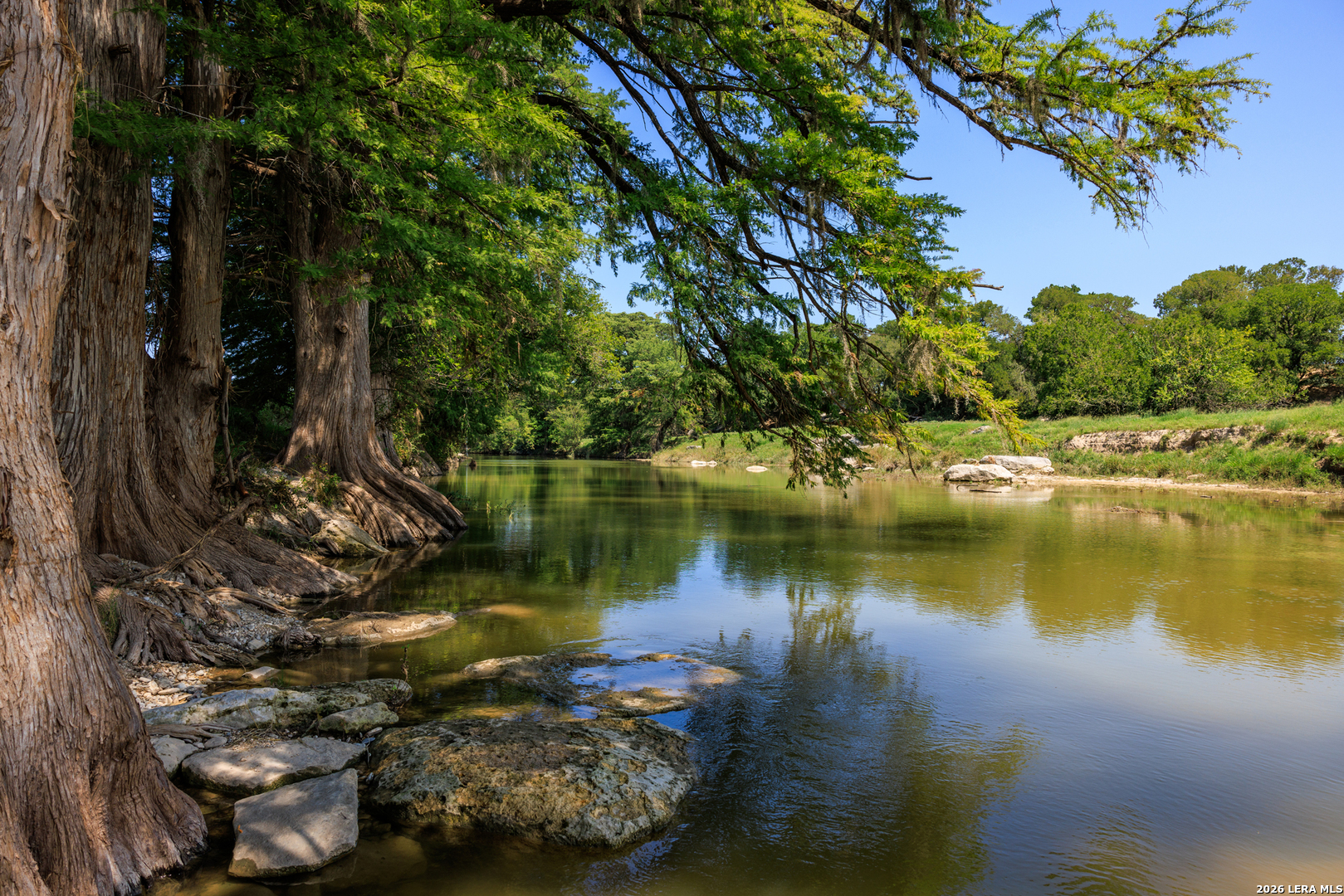 0 Rancho Del Rio Guadalupe Comfort, TX 78013 - Photo 2 of 33 a view of a lake with houses