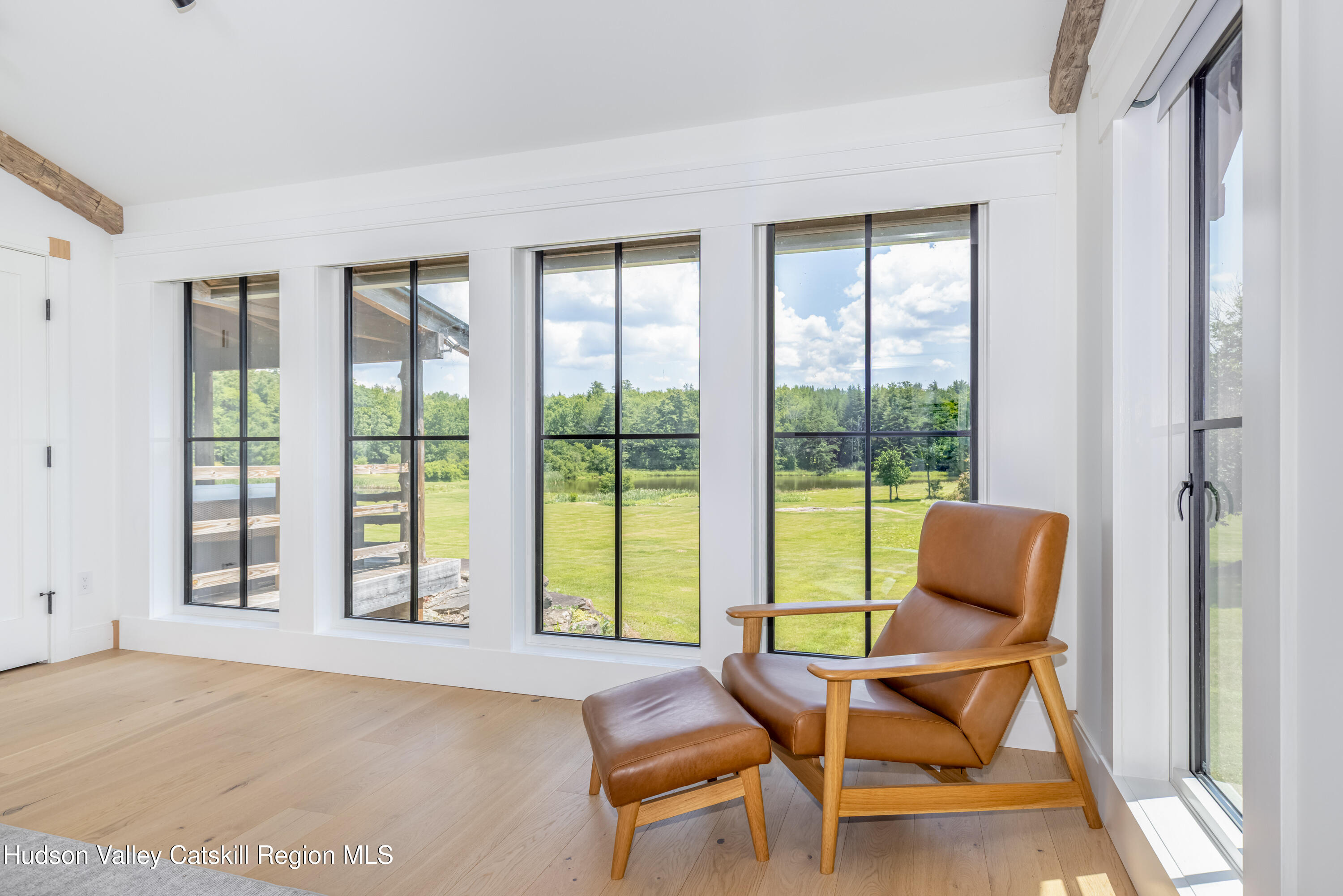 688 Bruce Porn Road Gilboa, NY 12167 - Photo 64 of 104 a living room with furniture and a window