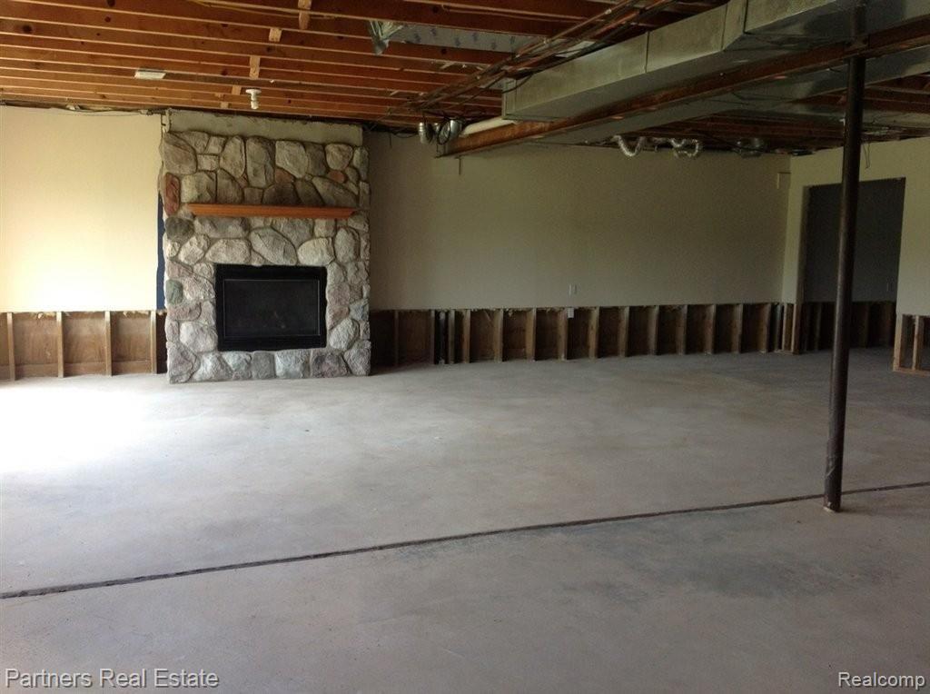 6817 West Lange Road Fowlerville, MI 48836 - Photo 17 of 21 Partially Finished Basement