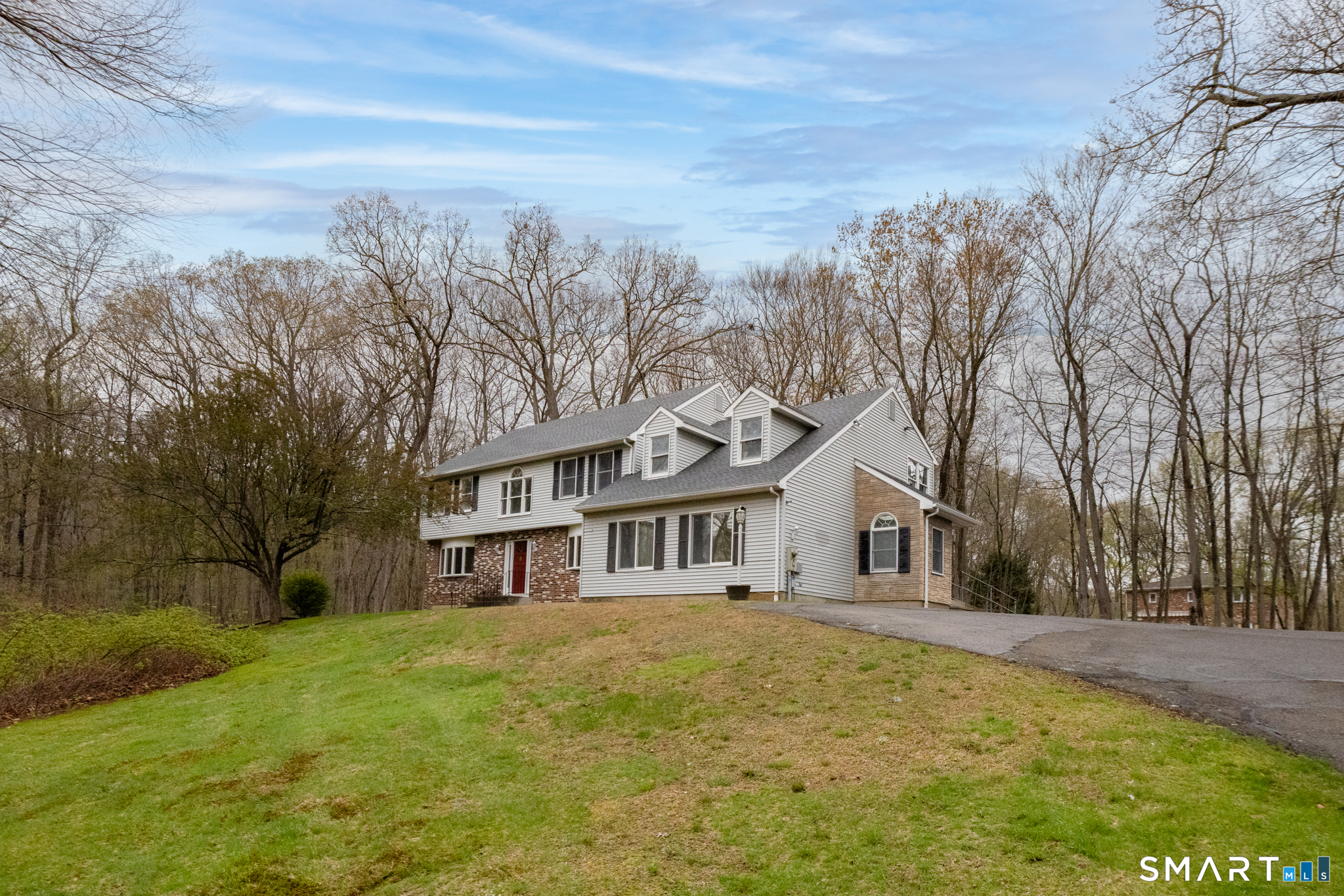 Center hall colonial with garage converted to office. Great for au pair or possible in law.