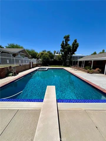 a view of balcony with wooden floor