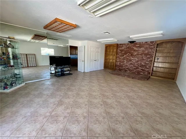 a view of livingroom with furniture and windows