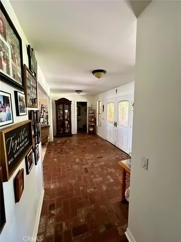 a spacious bedroom with a large bed and a closet