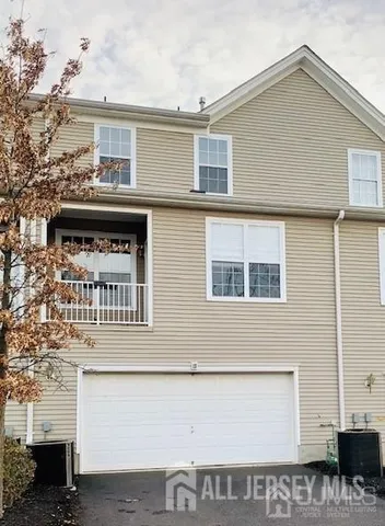 a front view of a building with windows