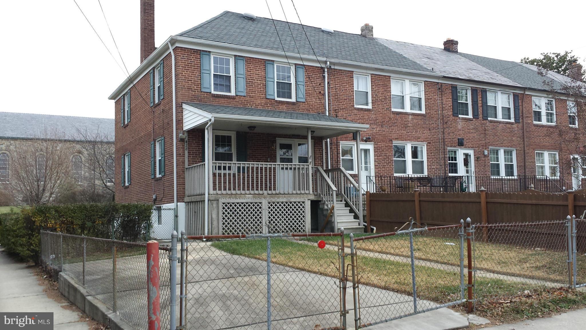 428 Overbrook Road Baltimore, MD 21212 - Photo 13 of 13 a front view of a house with a yard