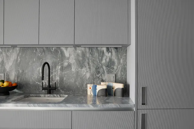 a view of swimming pool with a lounge chairs