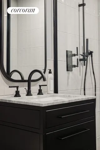 a living room filled with furniture and a potted plant