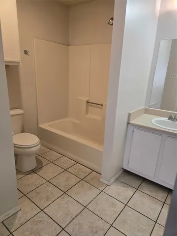 a bathroom with a sink and a vanity
