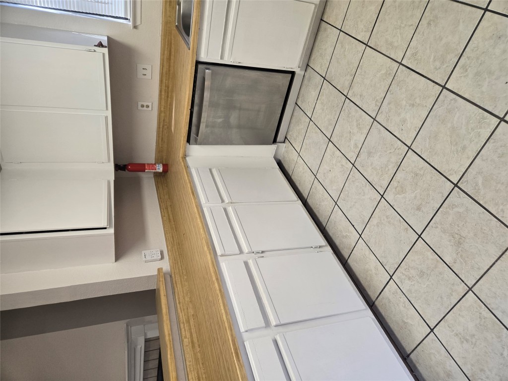 2903 West Slaughter Lane, Unit B Austin, TX 78748 - Photo 4 of 20 a kitchen with a sink and cabinets