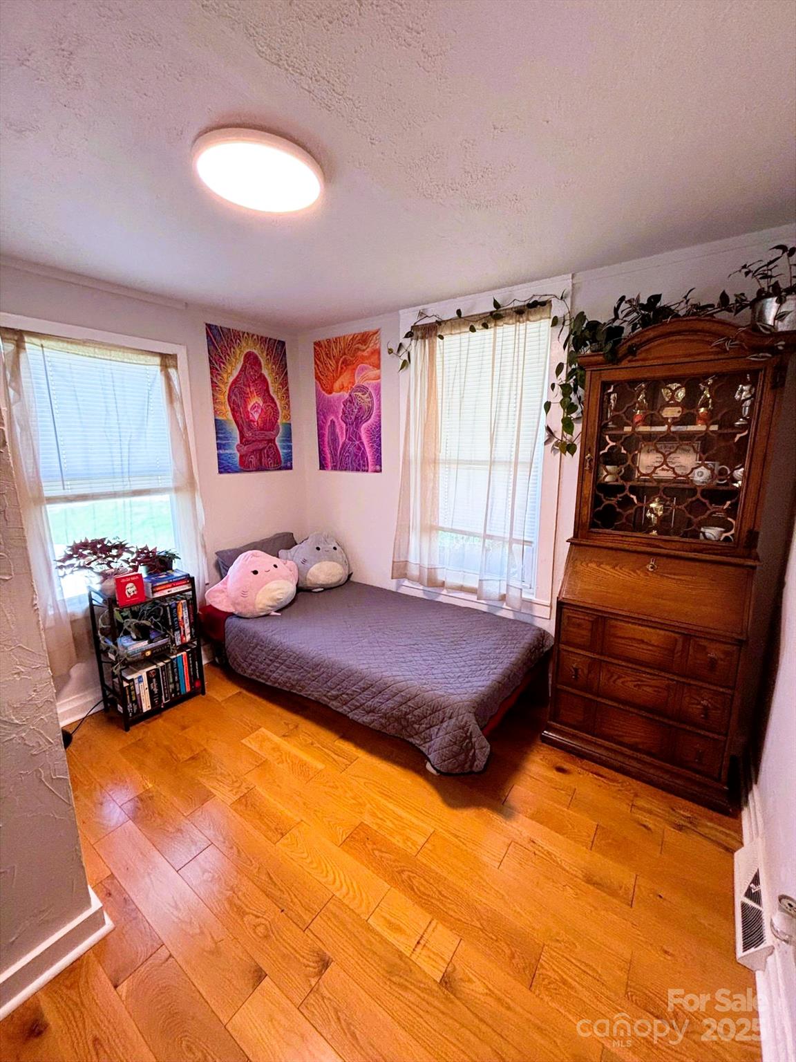 82 Elizabeth Street Canton, NC 28716 - Photo 12 of 17 a bedroom with furniture and a bed