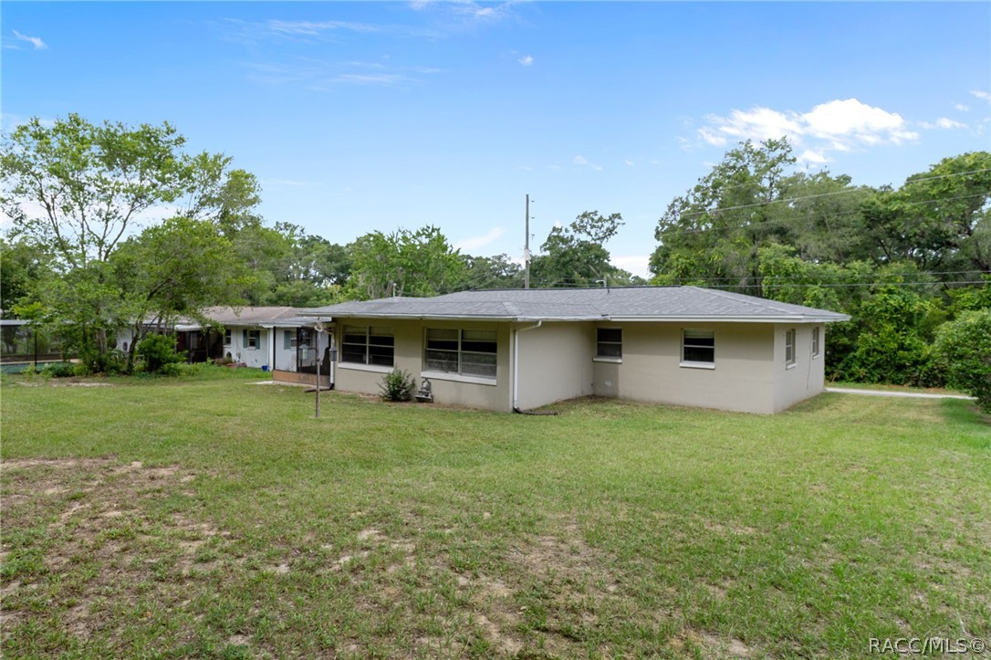 3355 South Highlands Avenue Inverness, FL 34452 - Photo 30 of 30 a house view with a garden space