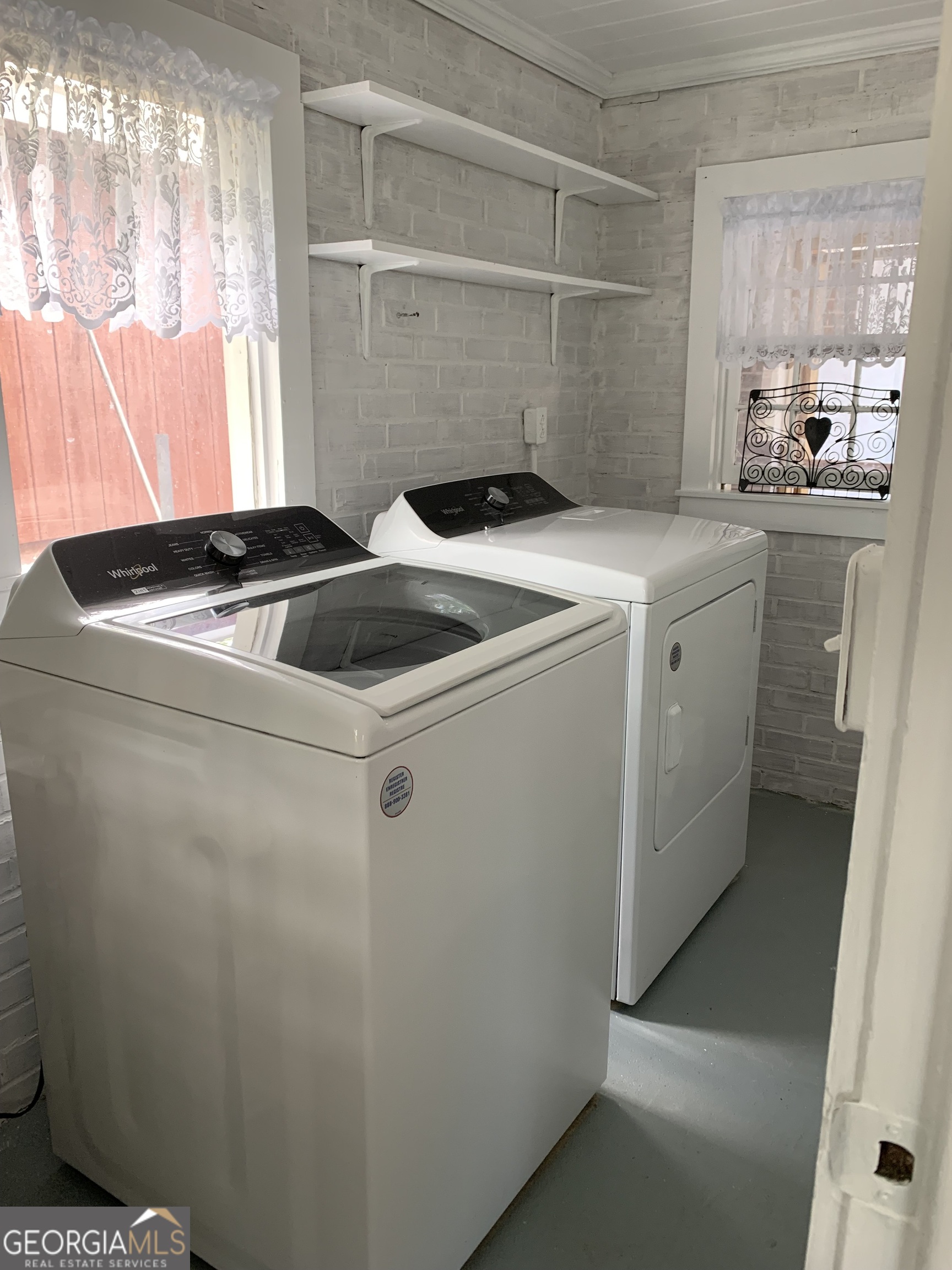 1066 Millen Hiltonia Road Sylvania, GA 30467 - Photo 13 of 24 a utility room with dryer and washer