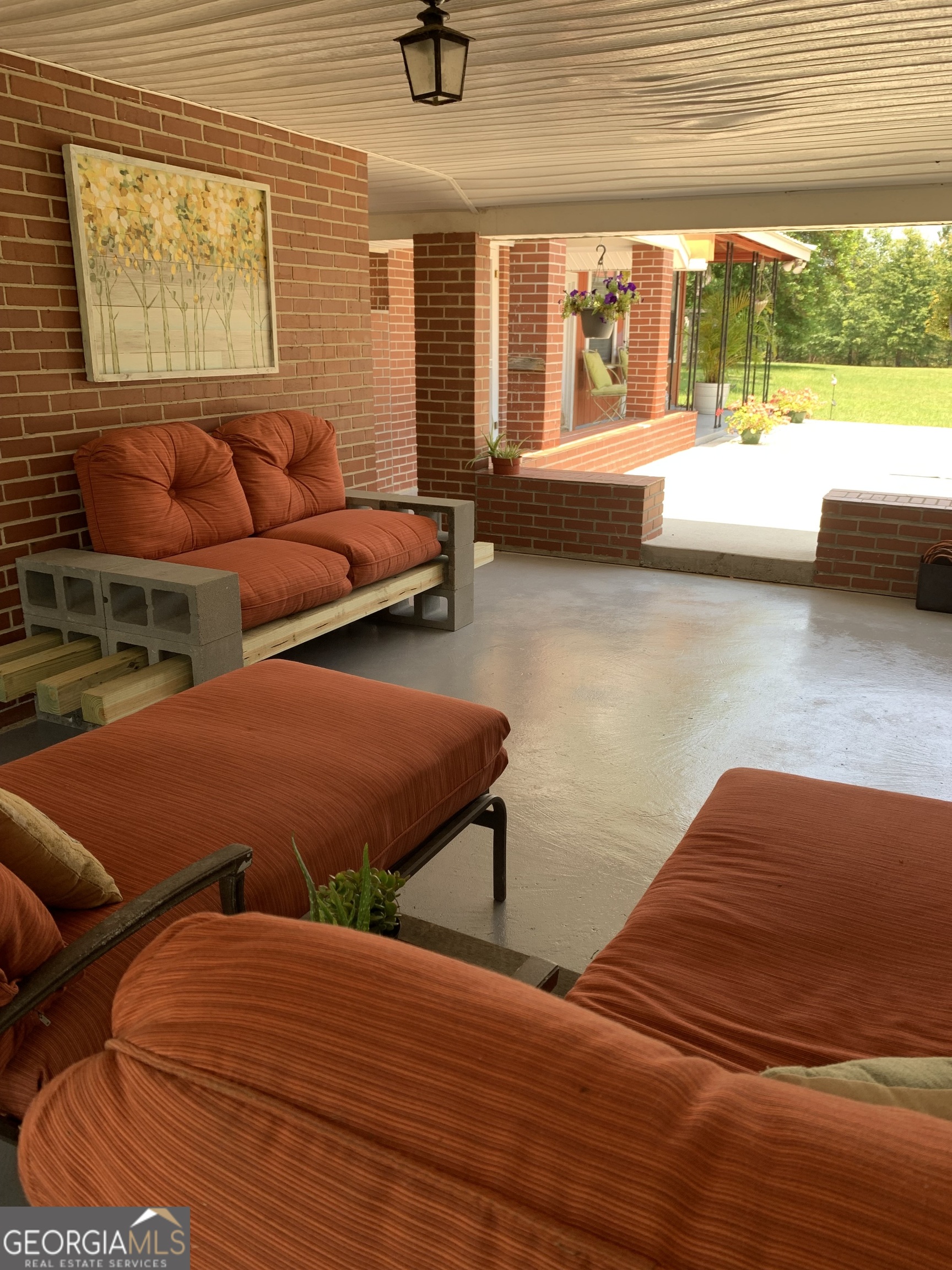 1066 Millen Hiltonia Road Sylvania, GA 30467 - Photo 14 of 24 a bedroom with furniture and a large window