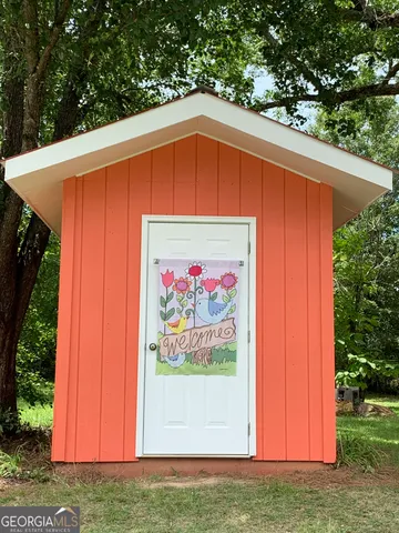 a view of a door and an entryway