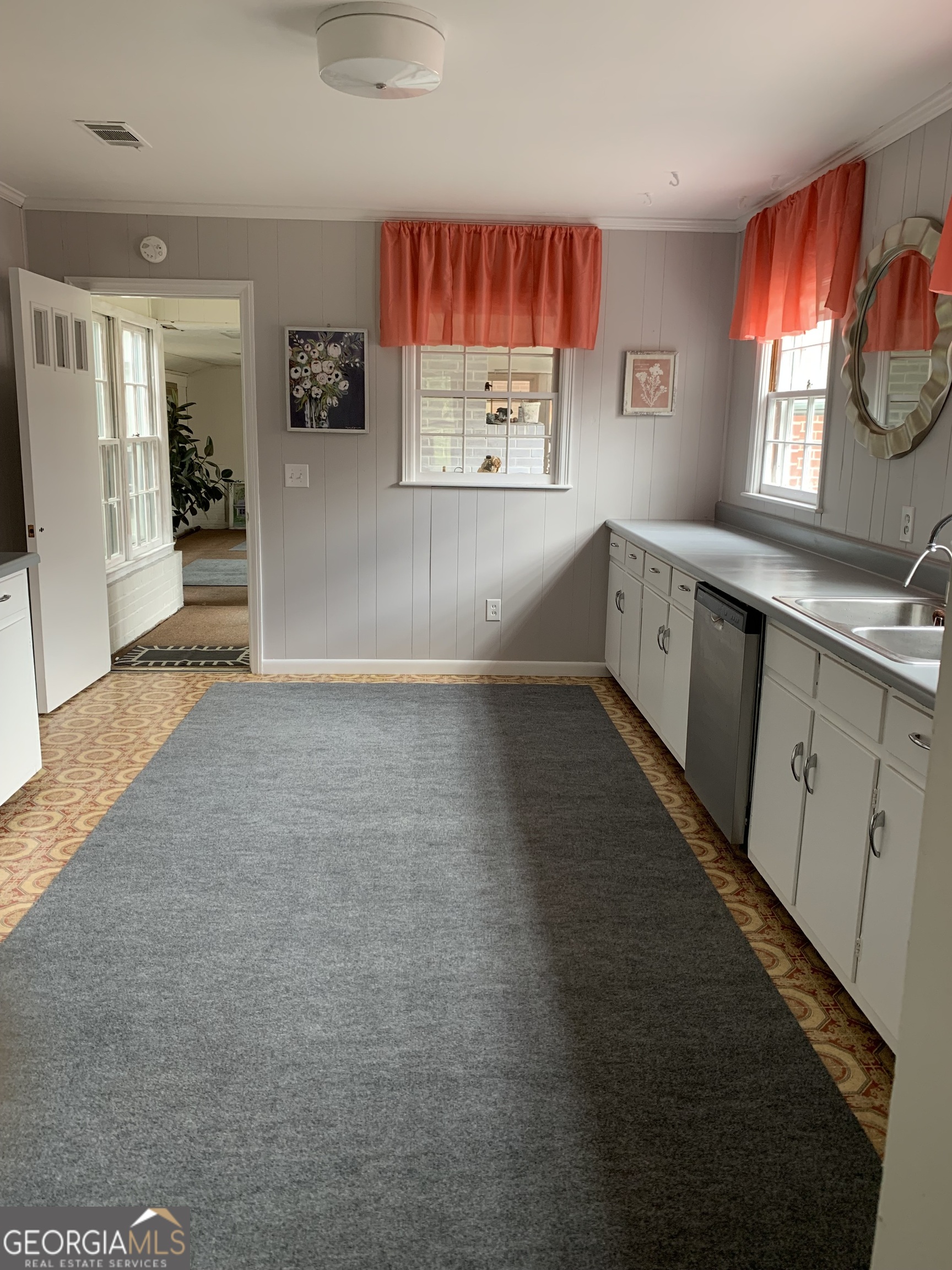1066 Millen Hiltonia Road Sylvania, GA 30467 - Photo 3 of 24 a view of kitchen with windows and refrigerator