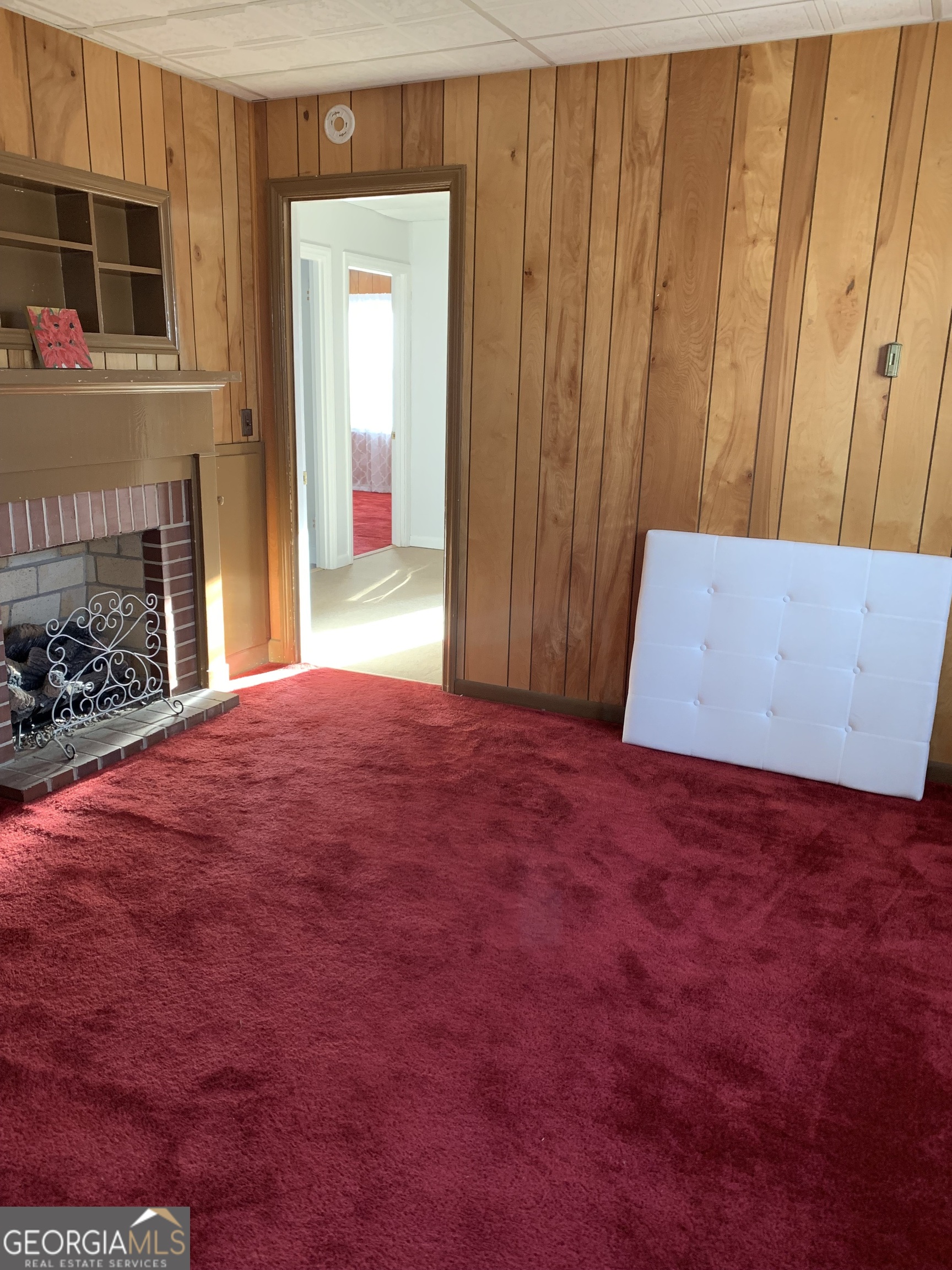 1066 Millen Hiltonia Road Sylvania, GA 30467 - Photo 8 of 24 a view of an empty room with a fireplace
